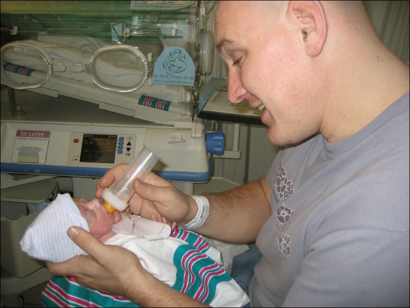 Dad feeding Owen